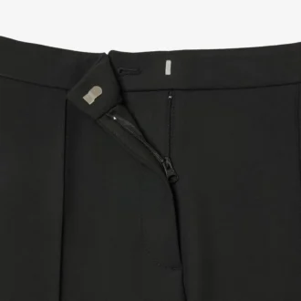 Damesjurk met hoge taille en uitlopende pijpen