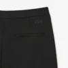 Damesjurk met hoge taille en uitlopende pijpen