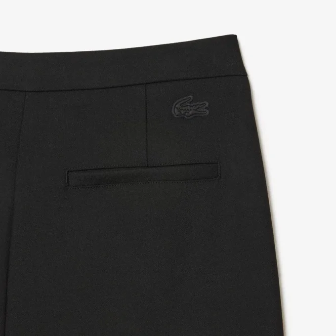 Damesjurk met hoge taille en uitlopende pijpen