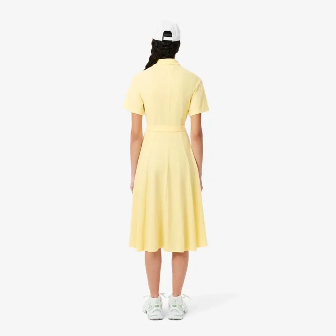 Flared Mini-Piqua polojurk voor dames