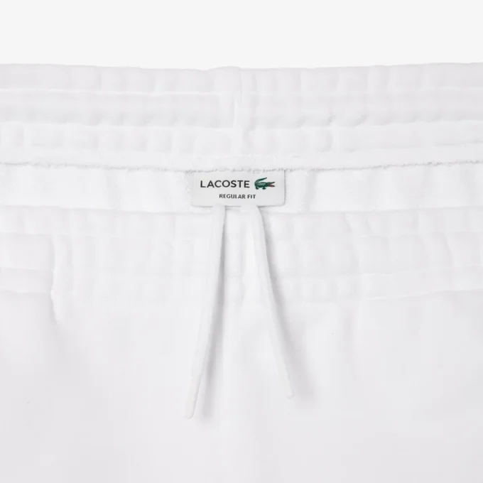 Heren fleece short met geborduurde tekst en normale pasvorm