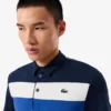 Heren golfpolo met regular fit en kleurblokken