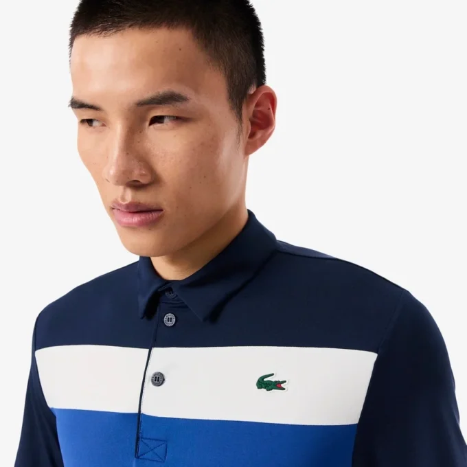 Heren golfpolo met regular fit en kleurblokken