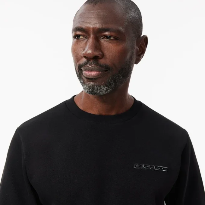 Herenpolo met Piqua-badge-Sweatshirt