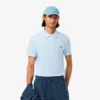 L.12.12 Piqué-polo voor heren met slanke pasvorm