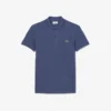 L.12.12 Piqué-polo voor heren met slanke pasvorm