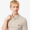 L.12.12 Piqué-polo voor heren met slanke pasvorm