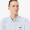L.12.12 Piqué-polo voor heren met slanke pasvorm