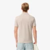 L.12.12 Piqué-polo voor heren met slanke pasvorm