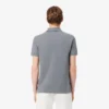 L.12.12 Piqué-polo voor heren met slanke pasvorm