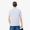 L.12.12 Piqué-polo voor heren met slanke pasvorm