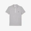L.12.12 Piqué-polo voor heren met slanke pasvorm