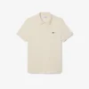 L.12.12 Piqué-polo voor heren met slanke pasvorm