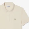 L.12.12 Piqué-polo voor heren met slanke pasvorm