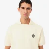 Loose fit fleece Polo with badge-accent