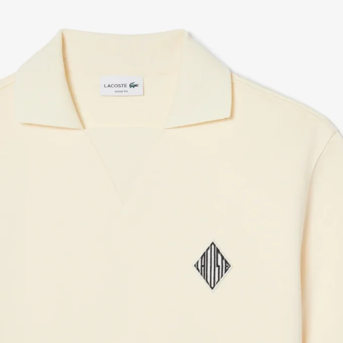 Loose fit fleece Polo with badge-accent