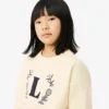 Neopreen sweatshirt met geborduurde badge