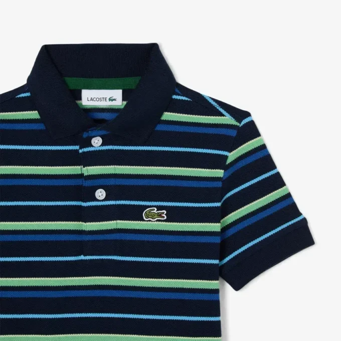 Petit Piqua-polo met contrasterende strepen