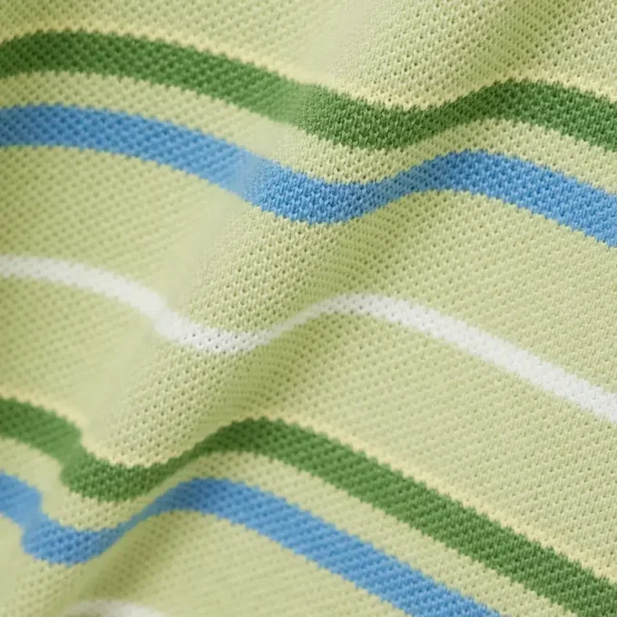 Petit Piqua-polo met contrasterende strepen