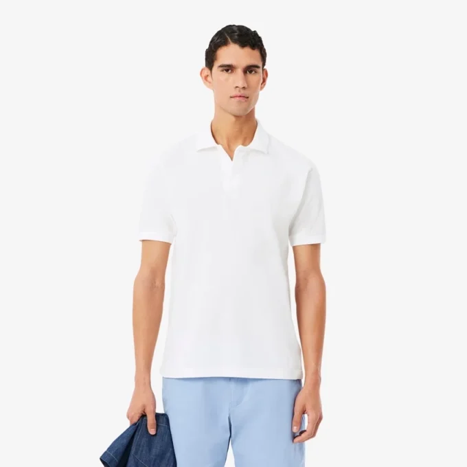 Petit Piqua-polo met klassieke pasvorm en geborduurde details
