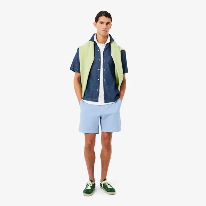 Petit Piqua-polo met klassieke pasvorm en geborduurde details
