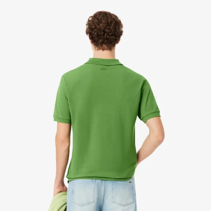 Petit Piqua-polo met klassieke pasvorm en geborduurde details