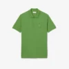 Petit Piqua-polo met klassieke pasvorm en geborduurde details