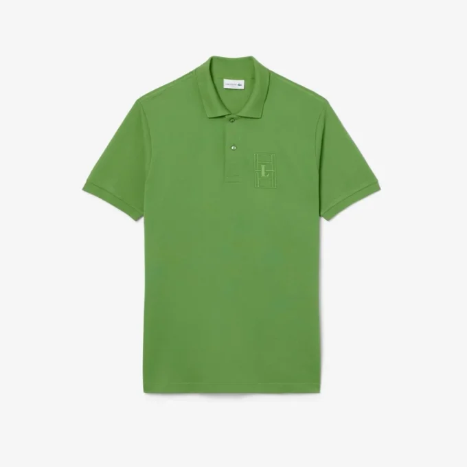 Petit Piqua-polo met klassieke pasvorm en geborduurde details