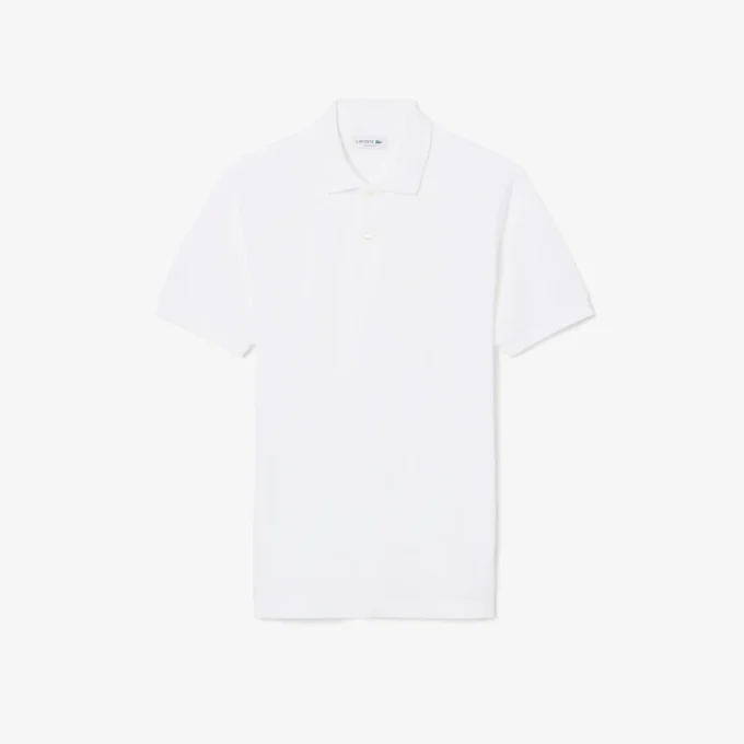 Petit Piqua-polo met klassieke pasvorm en geborduurde details