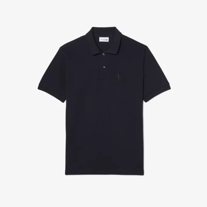 Petit Piqua-polo met klassieke pasvorm en geborduurde details