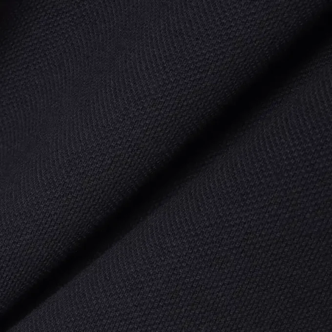 Petit Piqua-polo met klassieke pasvorm en geborduurde details