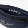 Play in Lacoste-heuptasje met riem