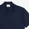 Polo met klassieke pasvorm en reliëflogo