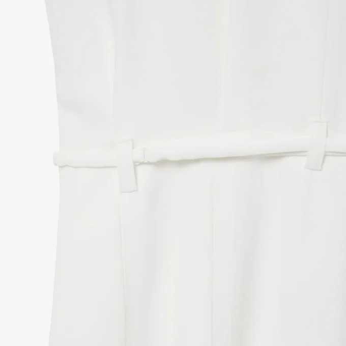 Runway-polojurk met plooien en borduursels