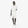 Runway-polojurk met plooien en borduursels