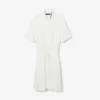 Runway-polojurk met plooien en borduursels