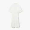 Runway-polojurk met plooien en borduursels