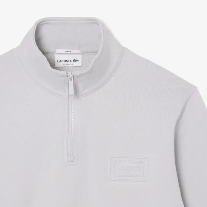 Sweatshirt met hoge kraag, reliëfprint en ritssluiting