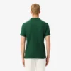 Ultra Dry Badge Accent Tennis Heritage-polo voor heren