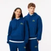 Unisex hoodie met losse pasvorm en badge-accent