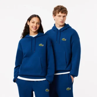 Unisex hoodie met losse pasvorm en badge-accent