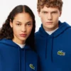 Unisex hoodie met losse pasvorm en badge-accent