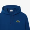 Unisex hoodie met losse pasvorm en badge-accent