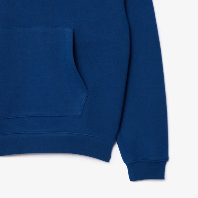 Unisex hoodie met losse pasvorm en badge-accent