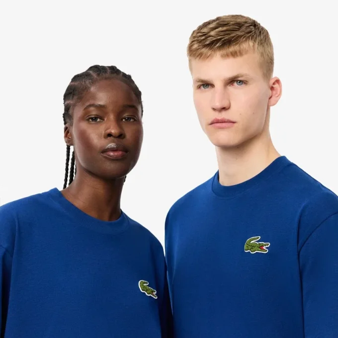 Unisex T-shirt met badge van zwaar katoen met losse pasvorm