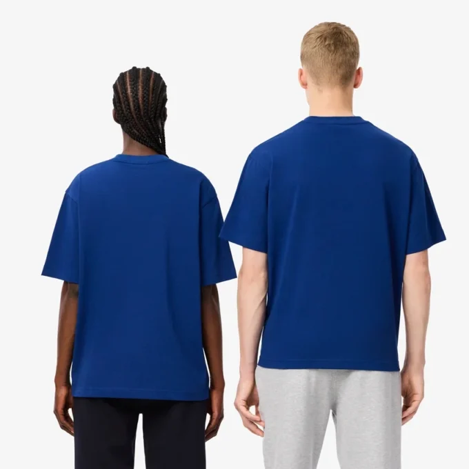 Unisex T-shirt met badge van zwaar katoen met losse pasvorm