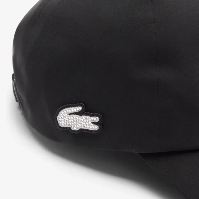 Unisex waterafstotende Diamanta-pet met krokodillenprint