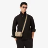 Verticale leren tas met monogram